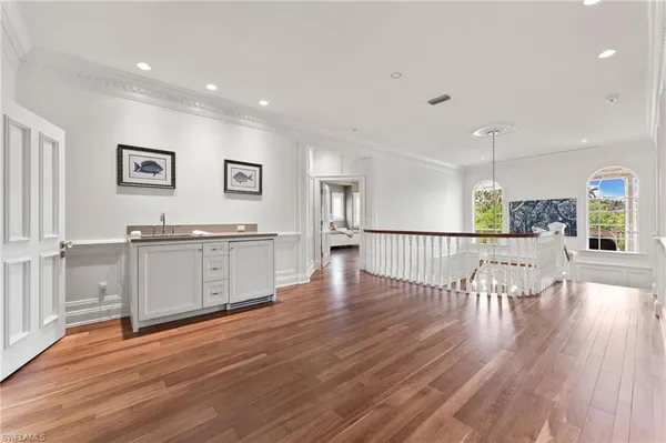 a view of entryway with wooden floor