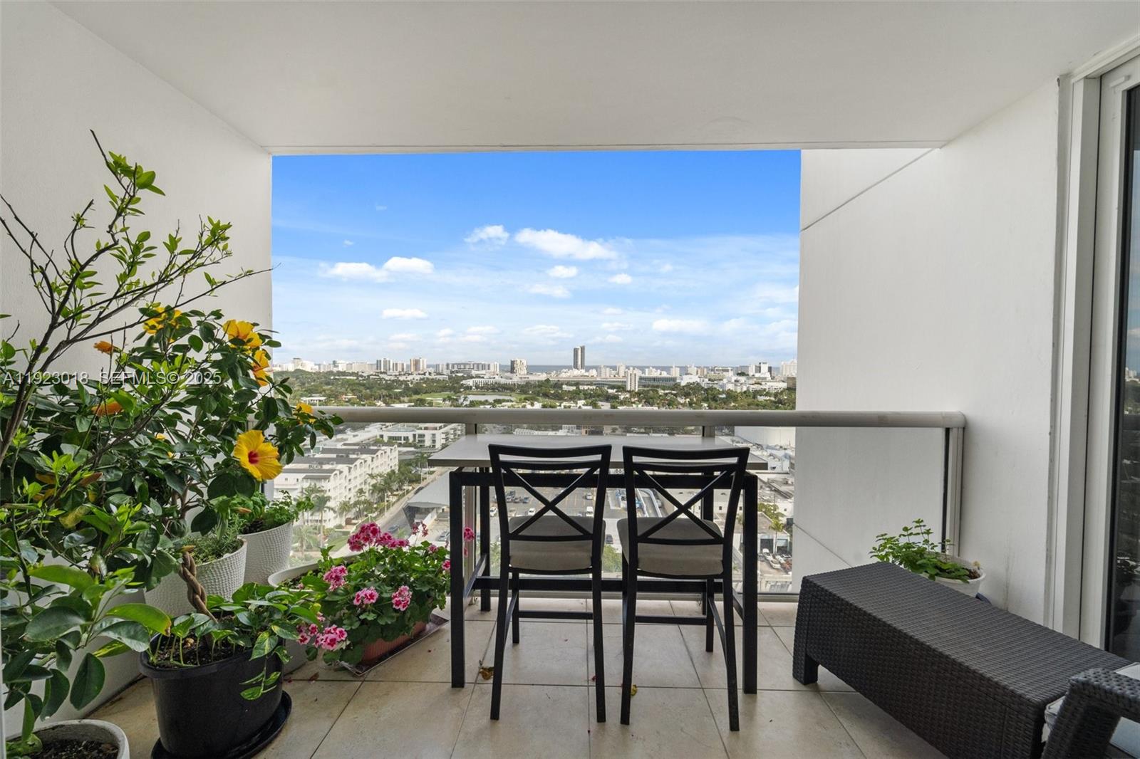 1900 Sunset Harbour Drive, Unit 2115 Miami Beach, FL 33139 - Photo 18 of 25 a view of a chairs and table in a terrace