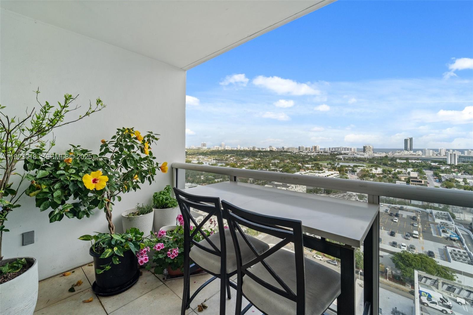 1900 Sunset Harbour Drive, Unit 2115 Miami Beach, FL 33139 - Photo 3 of 25 a view of a terrace with furniture and a potted plant