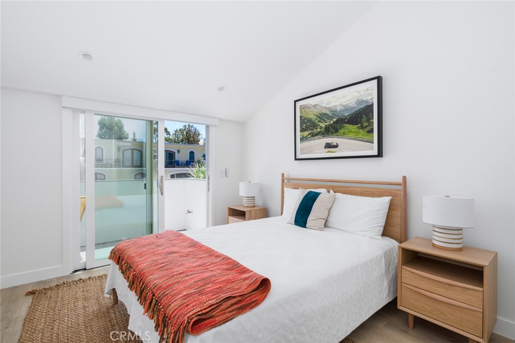 478 Morning Canyon Road Corona del Mar, CA 92625 - Photo 12 of 23 a bedroom with a bed and a painting on the wall