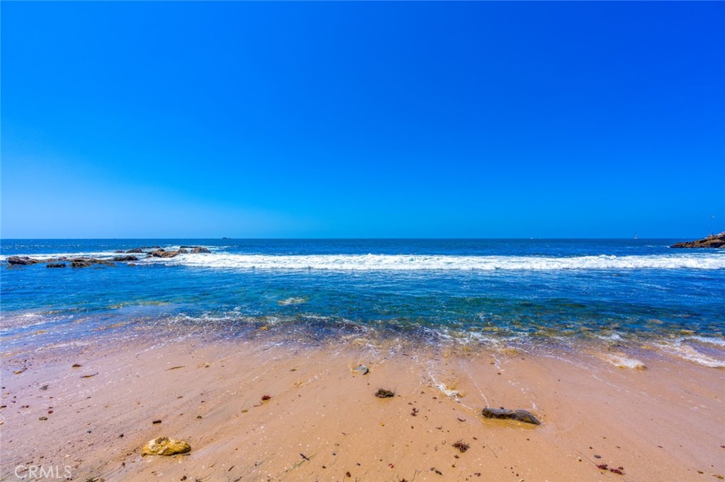 478 Morning Canyon Road Corona del Mar, CA 92625 - Photo 21 of 23 a view of an ocean beach