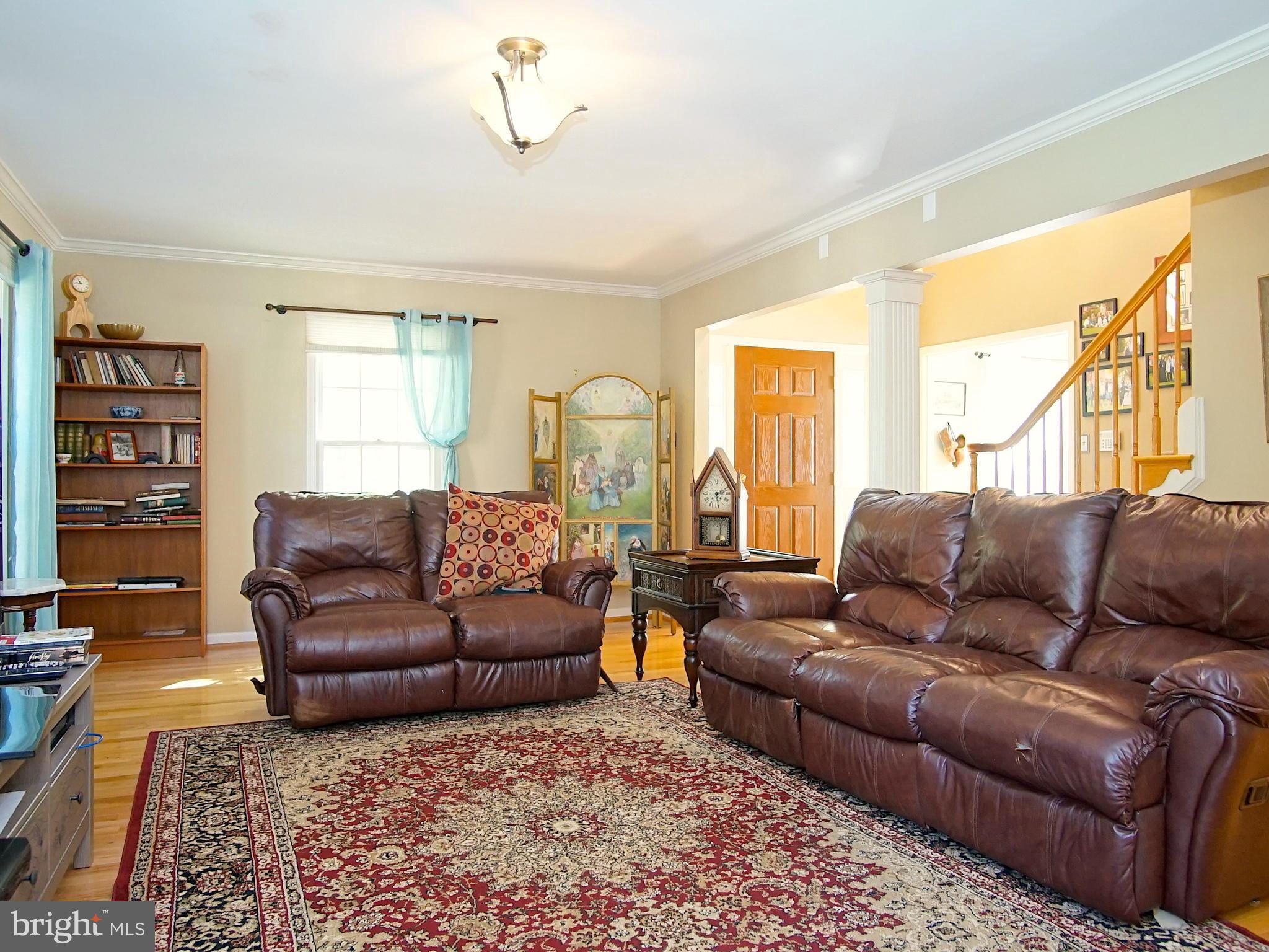227 Midsummer Circle Gaithersburg, MD 20878 - Photo 2 of 25 a living room with furniture and a window