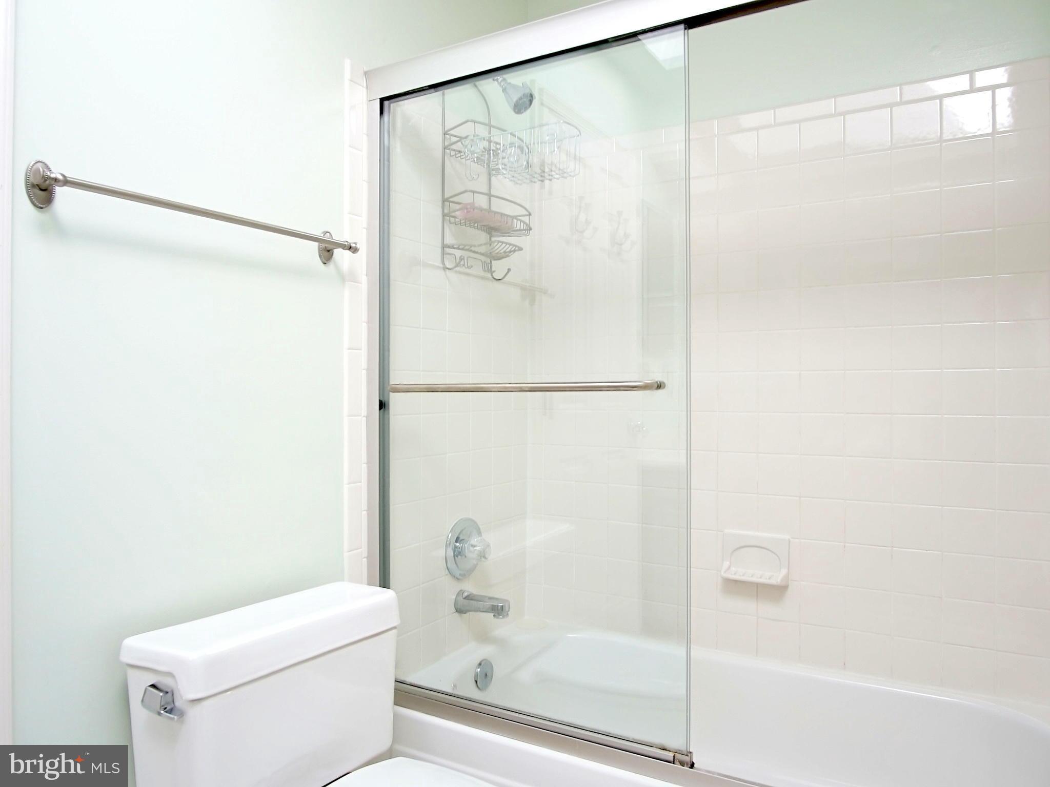 227 Midsummer Circle Gaithersburg, MD 20878 - Photo 17 of 25 a bathroom with a shower and a toilet
