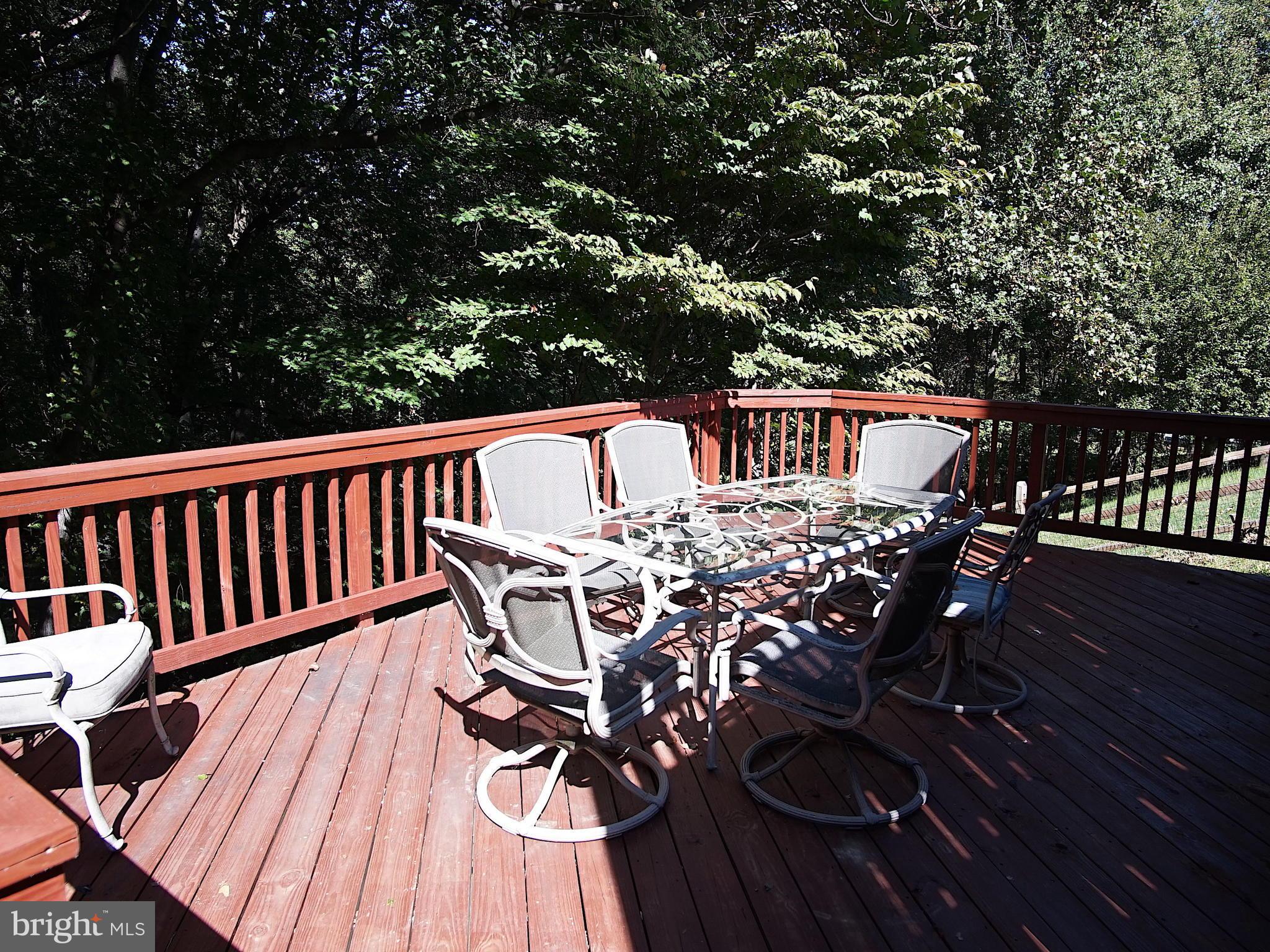 227 Midsummer Circle Gaithersburg, MD 20878 - Photo 24 of 25 a view of balcony with wooden floor and outdoor seating
