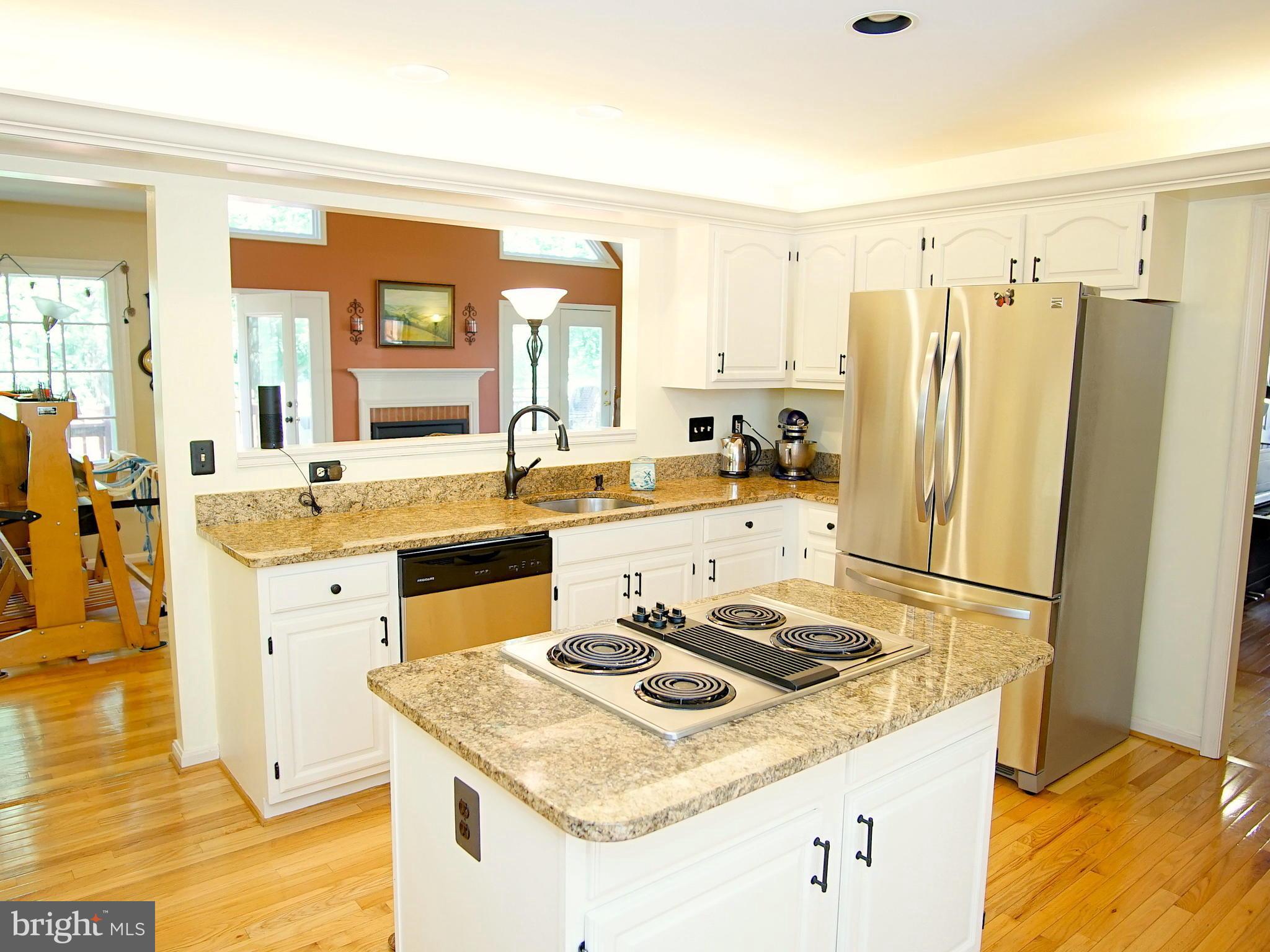 227 Midsummer Circle Gaithersburg, MD 20878 - Photo 8 of 25 a kitchen with a sink stove and refrigerator