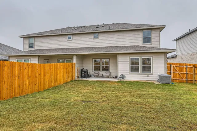 a view of a house with a swimming pool