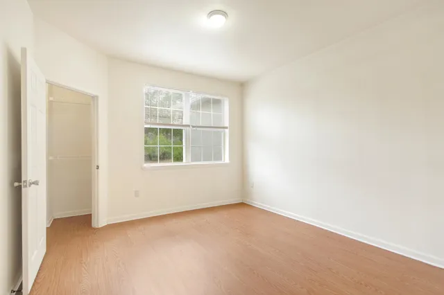 an empty room with windows