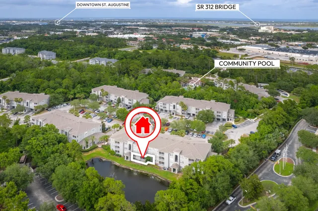 a sign on a pole on a street