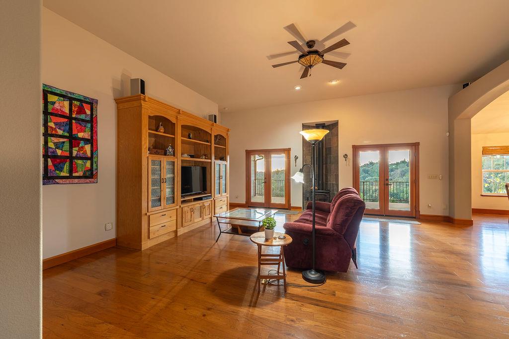 10132 Ranch Road Rough and Ready, CA 95975 - Photo 4 of 54 a living room with furniture and wooden floor