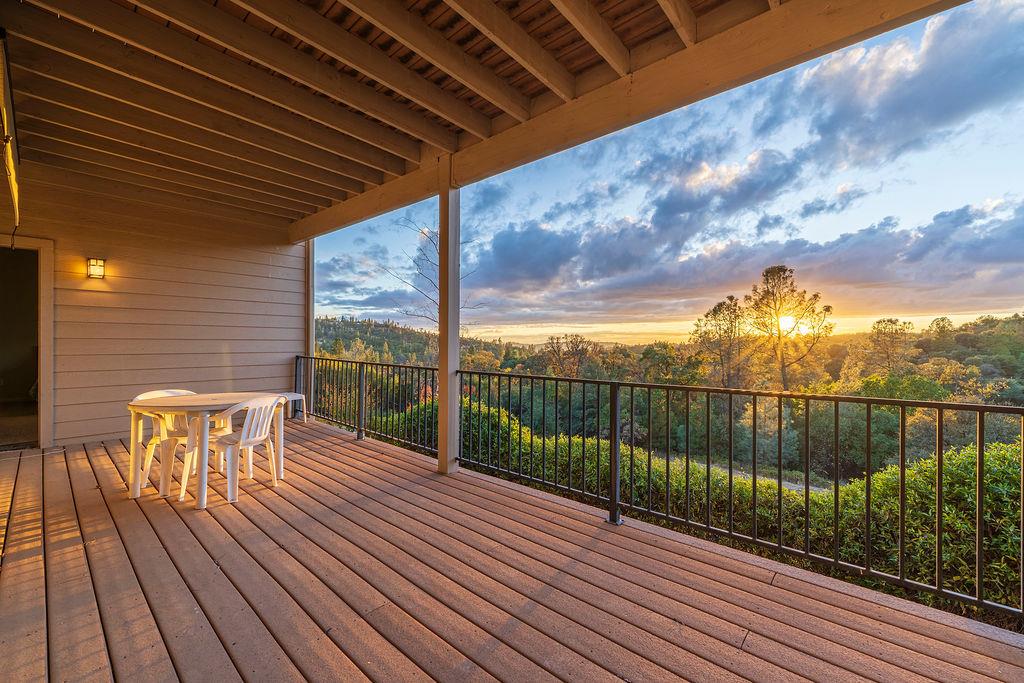 10132 Ranch Road Rough and Ready, CA 95975 - Photo 42 of 54 a view of a balcony with wooden floor
