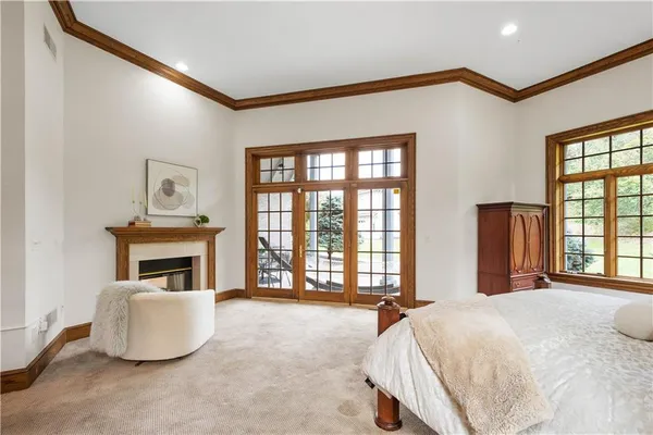 a bedroom with a bed and a couch