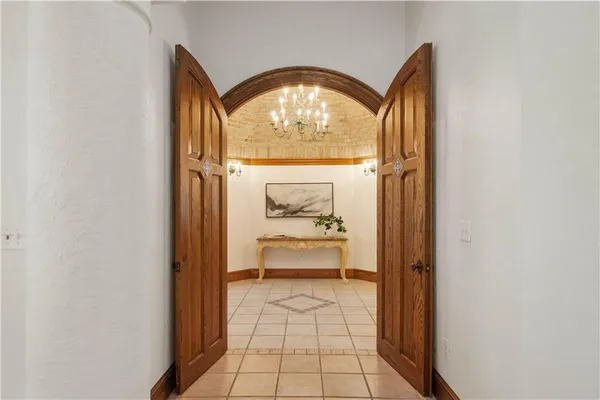 a view of a entryway door with wooden floor