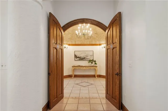 a view of a entryway door with wooden floor