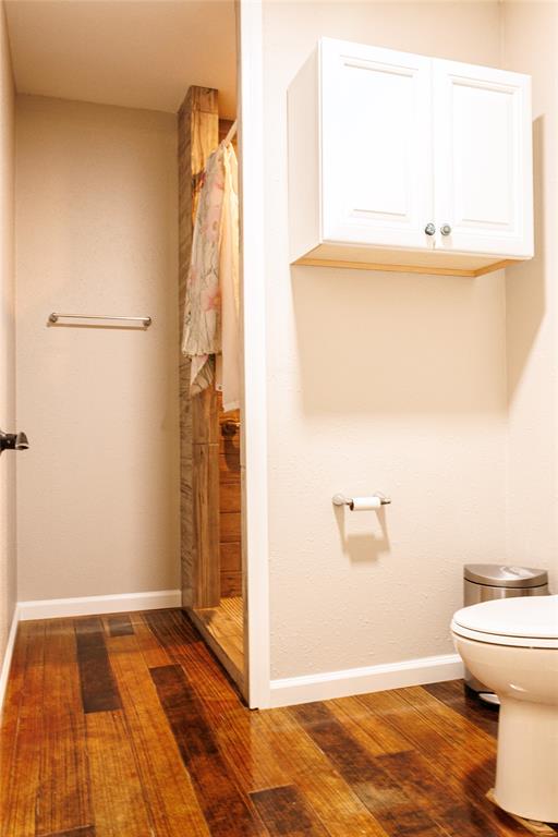 103 County Road Comanche, TX 76442 - Photo 13 of 37 a bathroom with a sink and a toilet
