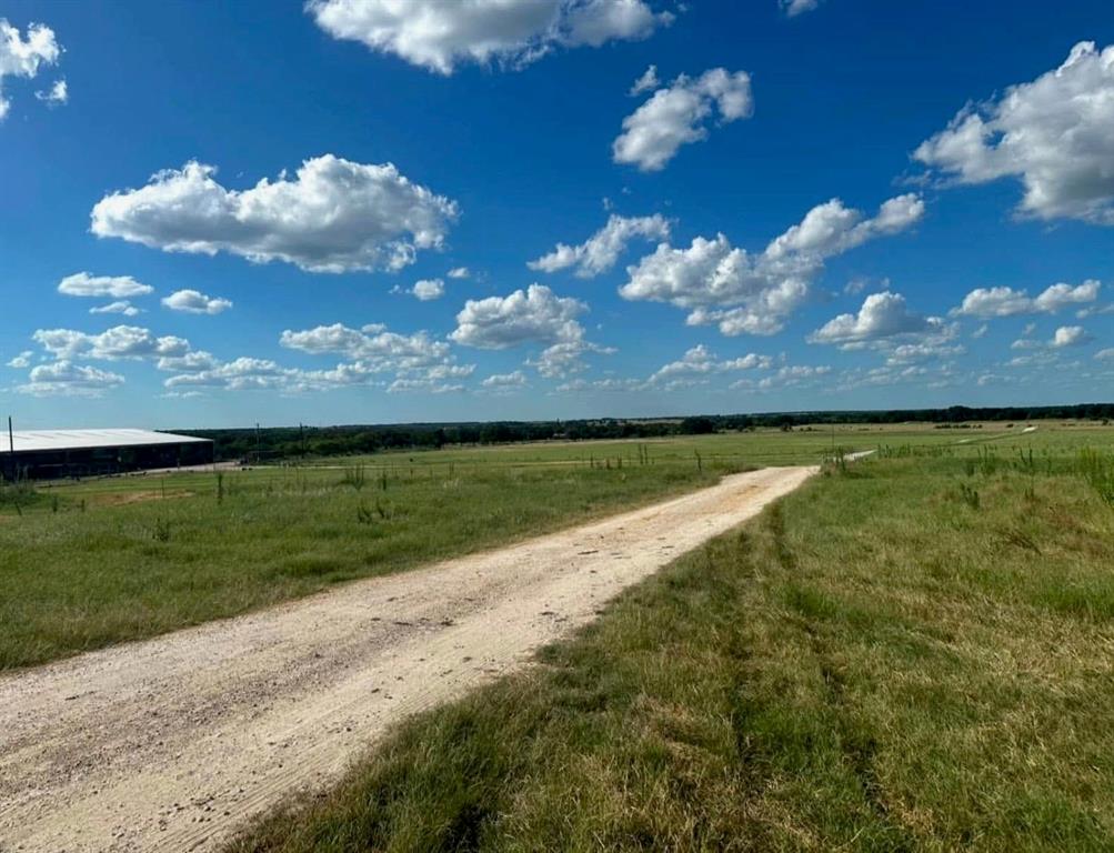 103 County Road Comanche, TX 76442 - Photo 6 of 37 a view of a lake from a yard