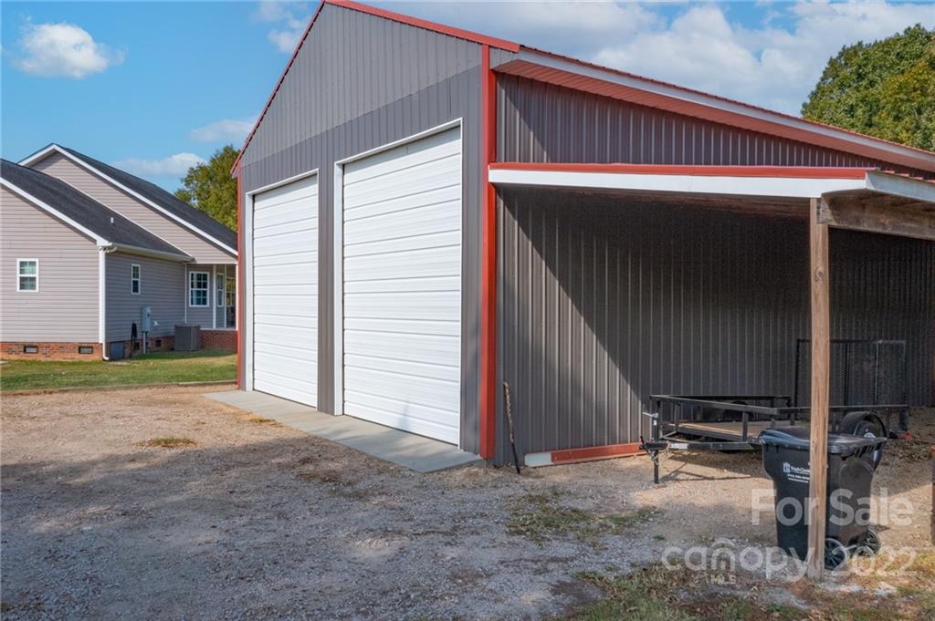 6925 Medlin Road Monroe, NC 28112 - Photo 21 of 41 a view of a house with backyard