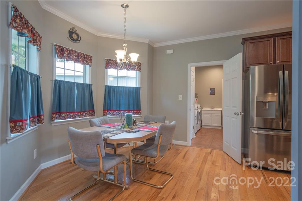 6925 Medlin Road Monroe, NC 28112 - Photo 10 of 41 a outdoor space with furniture and window