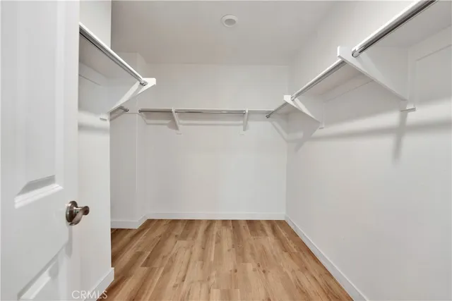 a view of an empty walk in closet