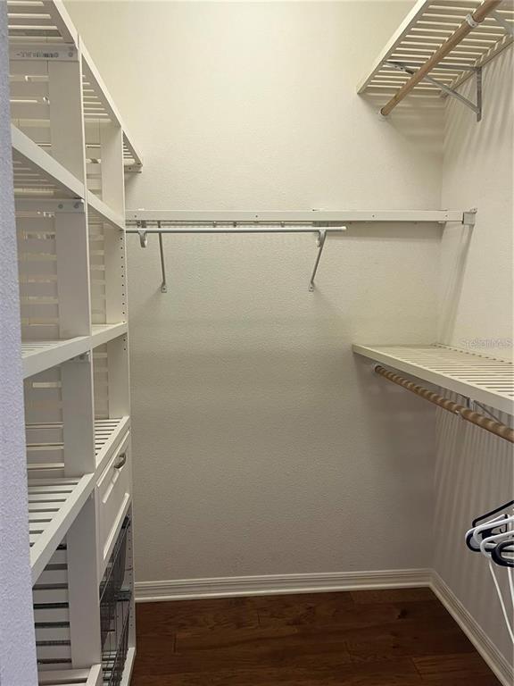 8908 Southwest 84th Circle Ocala, FL 34481 - Photo 13 of 24 a view of an empty walk in closet