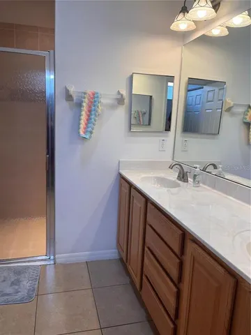 a bathroom with a sink a vanity and a mirror