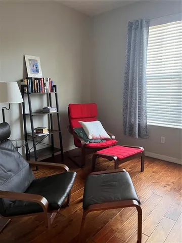 a bedroom with a bed and furniture