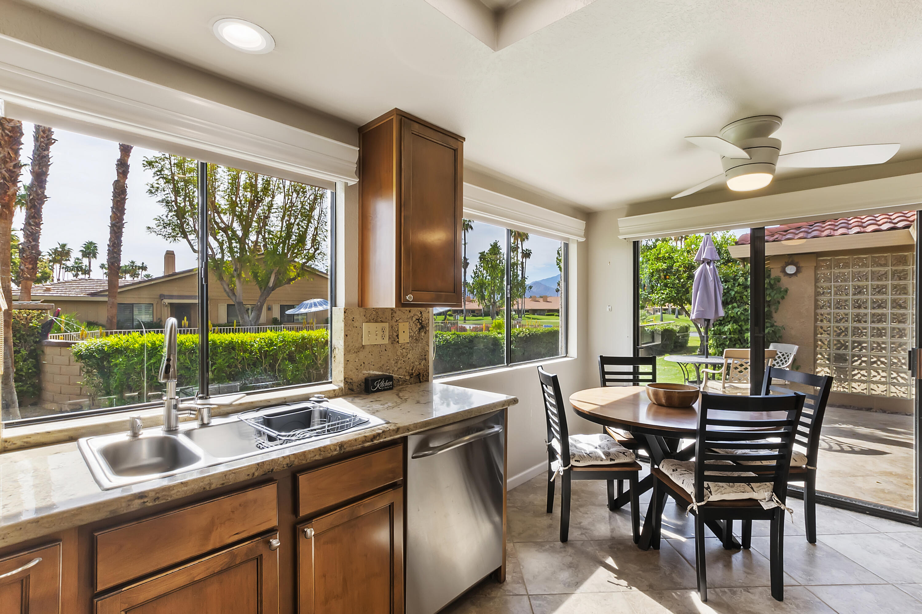 6 Maximo Way Palm Desert, CA 92260 - Photo 12 of 48 a outdoor dining space with furniture and window