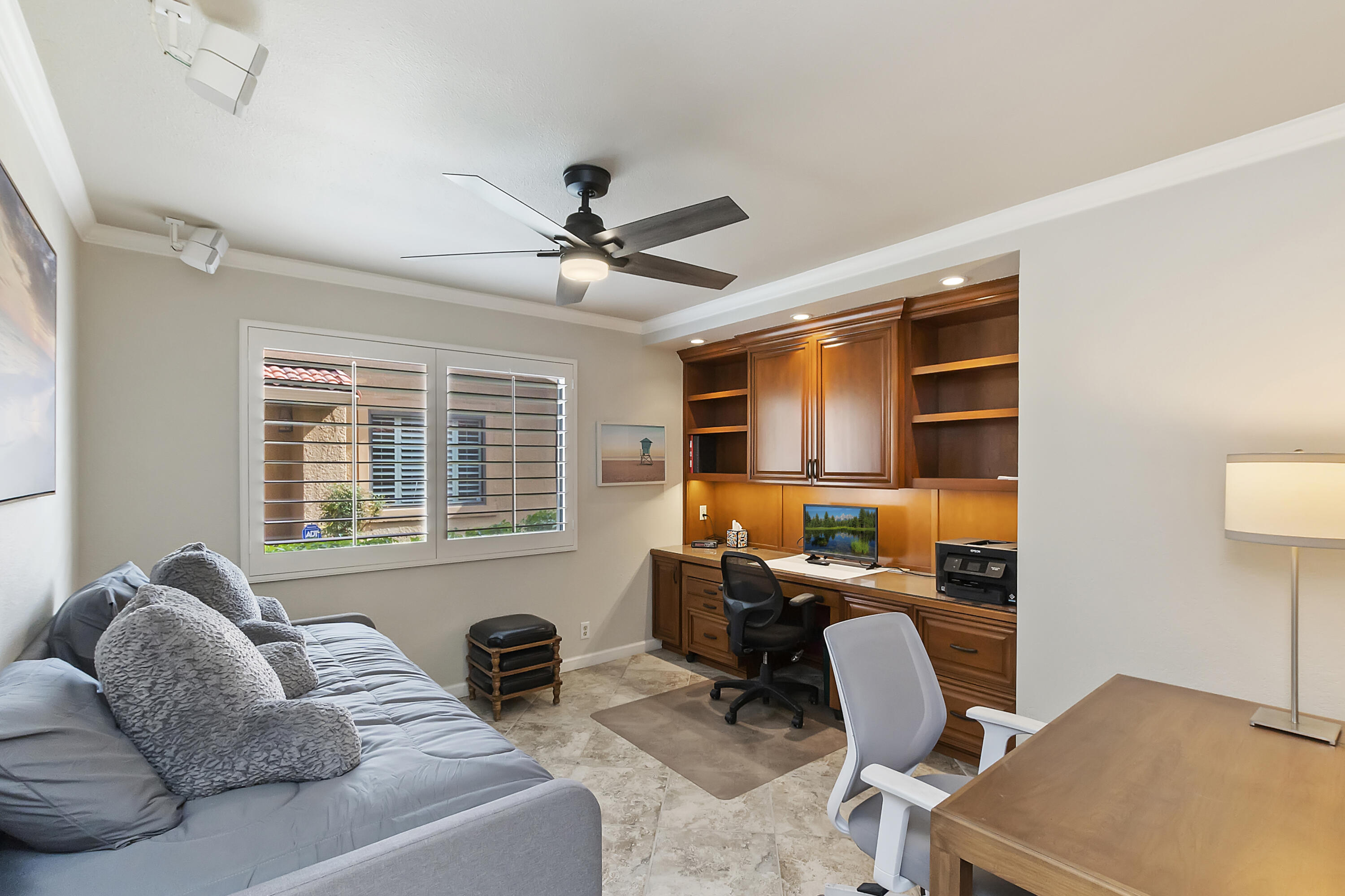 6 Maximo Way Palm Desert, CA 92260 - Photo 17 of 48 a livingroom with workspace and a couch