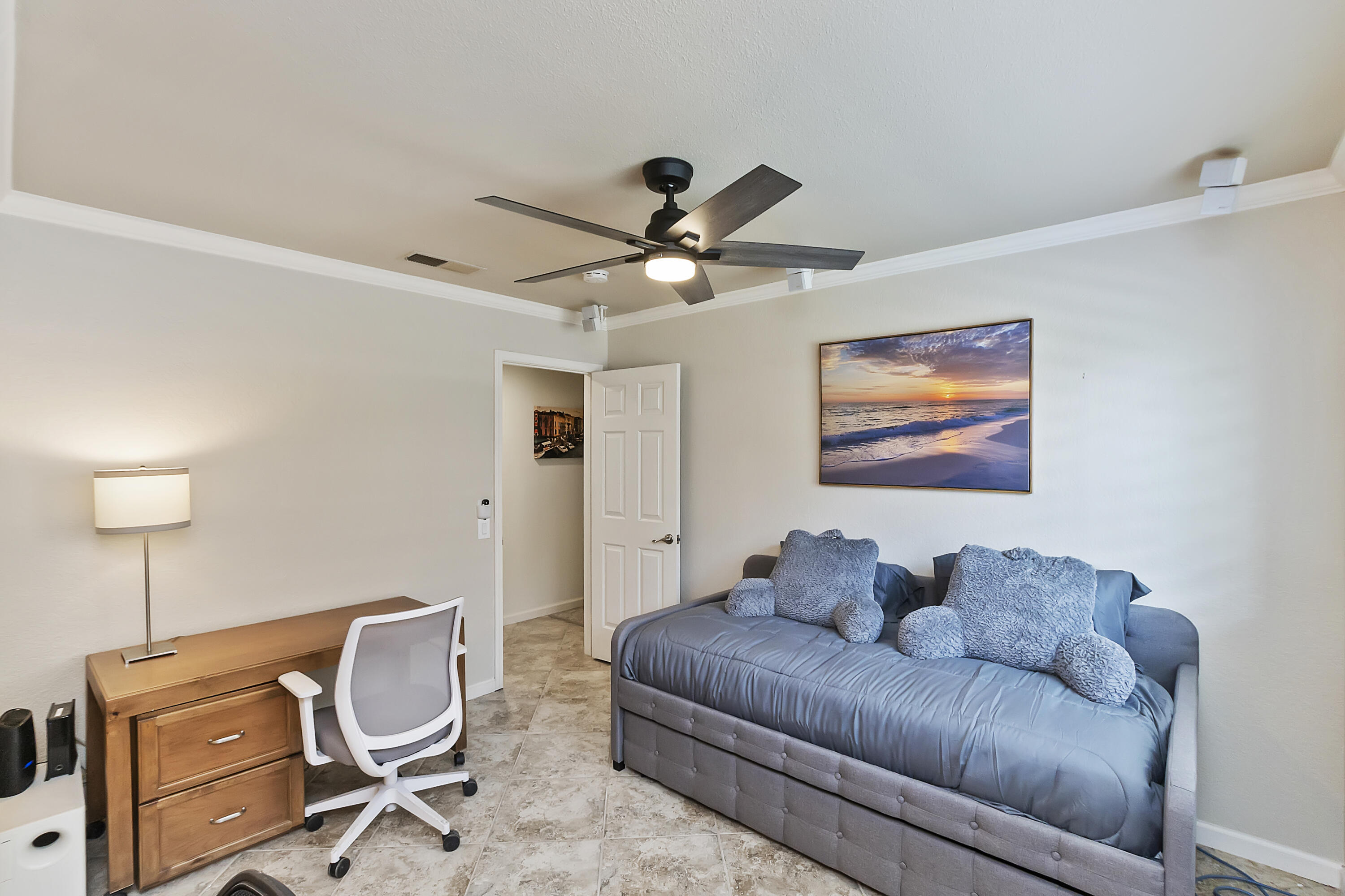 6 Maximo Way Palm Desert, CA 92260 - Photo 18 of 48 a living room with furniture and a ceiling fan