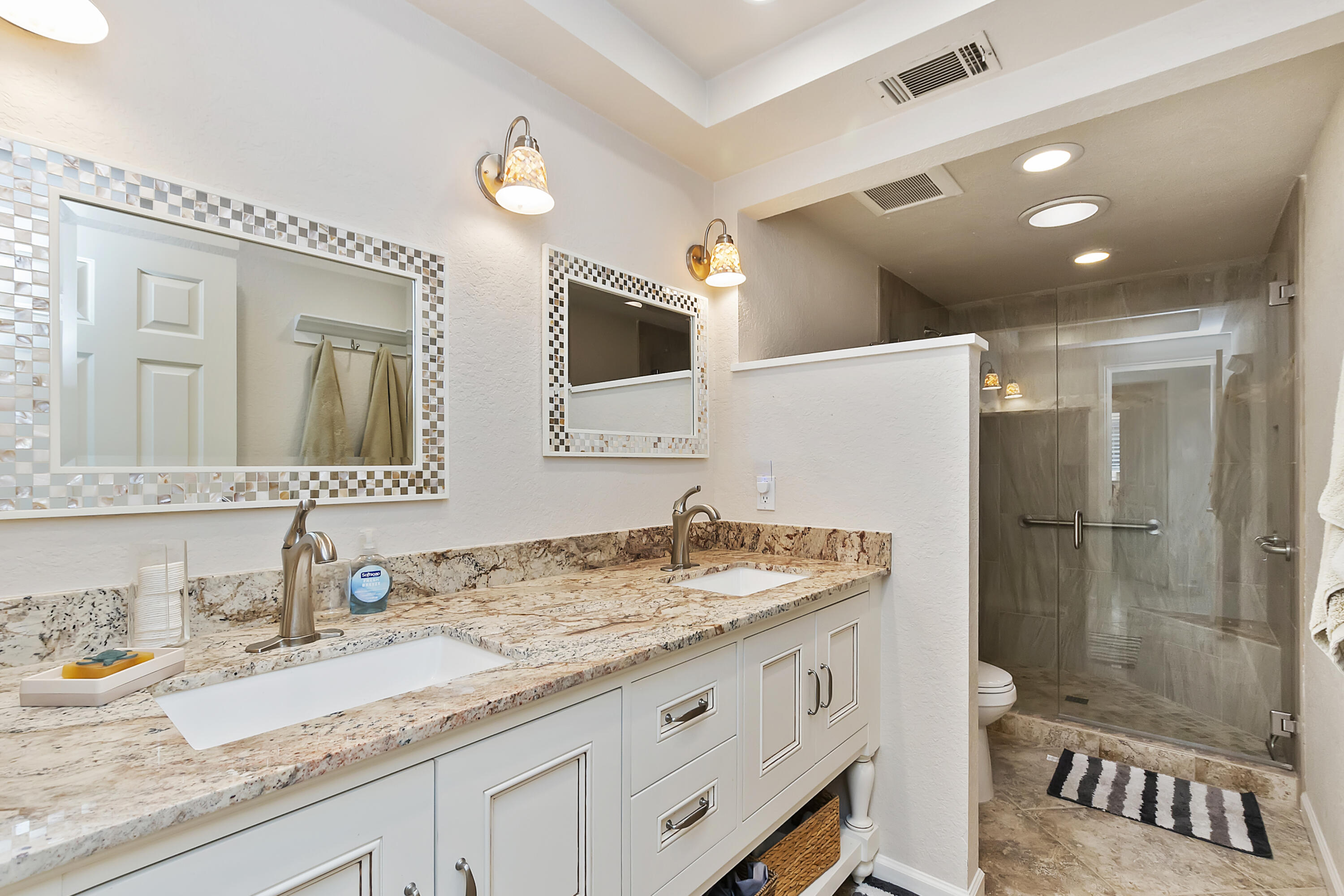 6 Maximo Way Palm Desert, CA 92260 - Photo 19 of 48 a bathroom with a granite countertop double vanity sink and a mirror