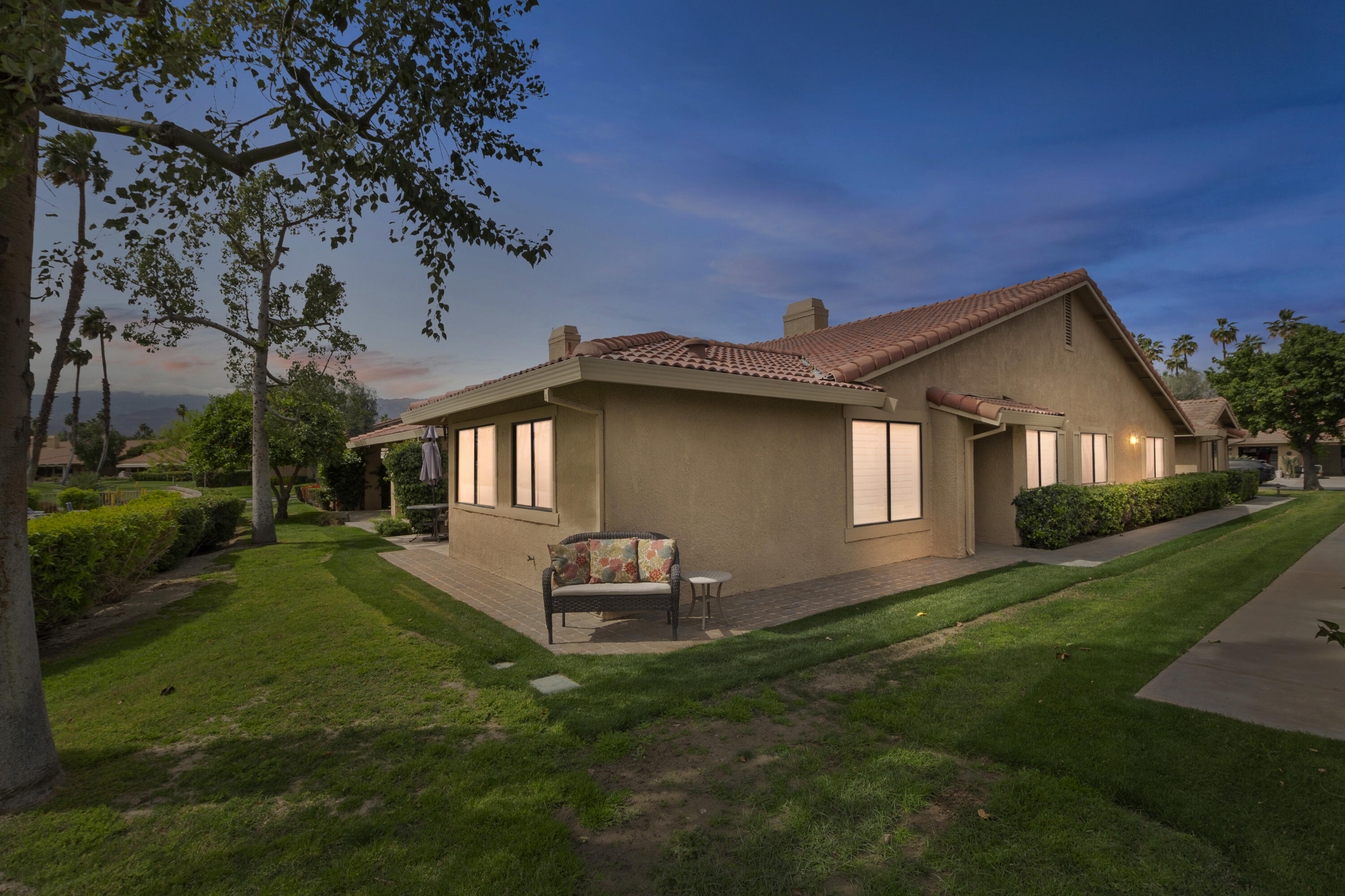 6 Maximo Way Palm Desert, CA 92260 - Photo 23 of 48 a front view of a house with garden