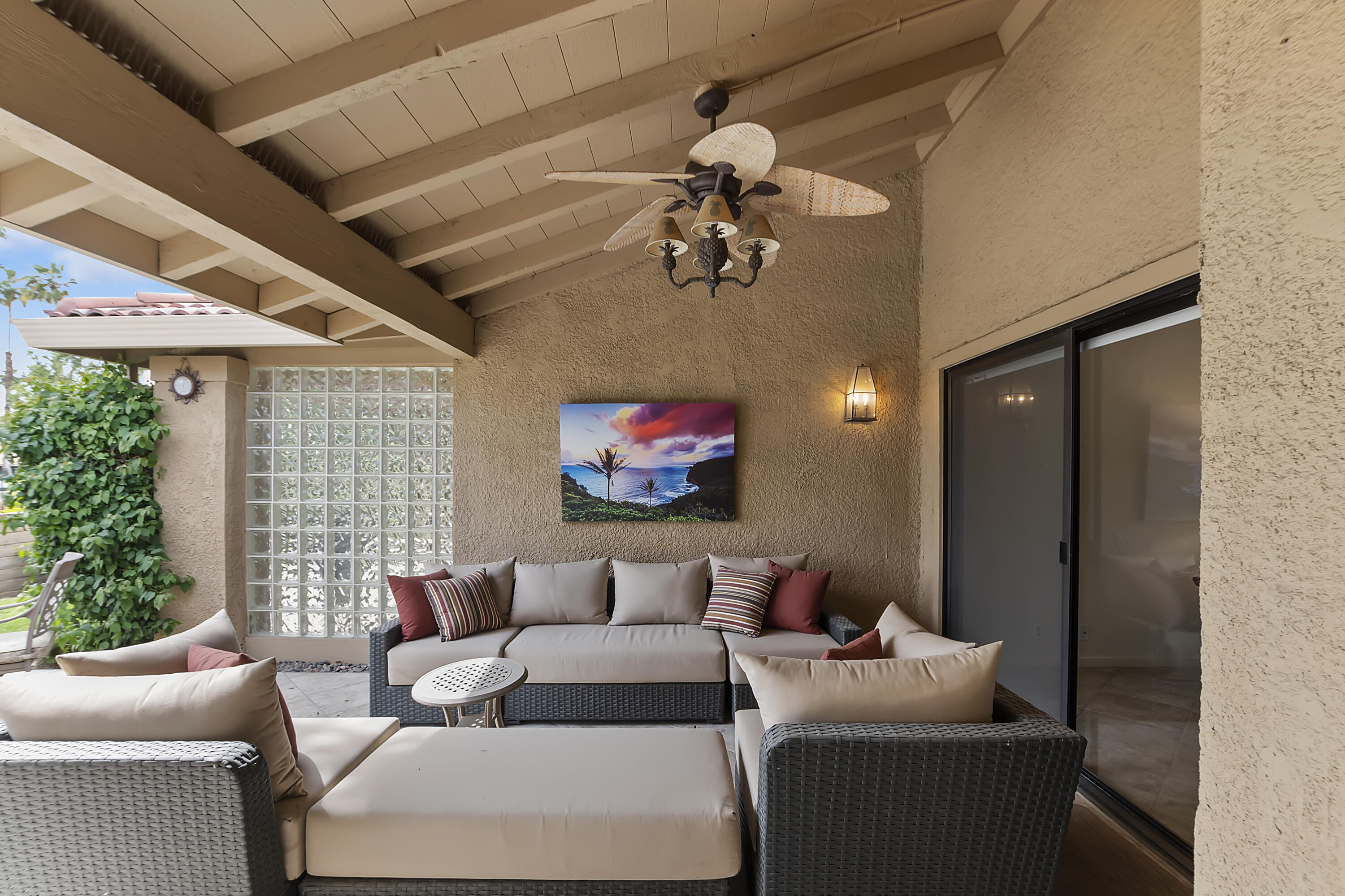 6 Maximo Way Palm Desert, CA 92260 - Photo 25 of 48 a living room with furniture a window and a flat screen tv