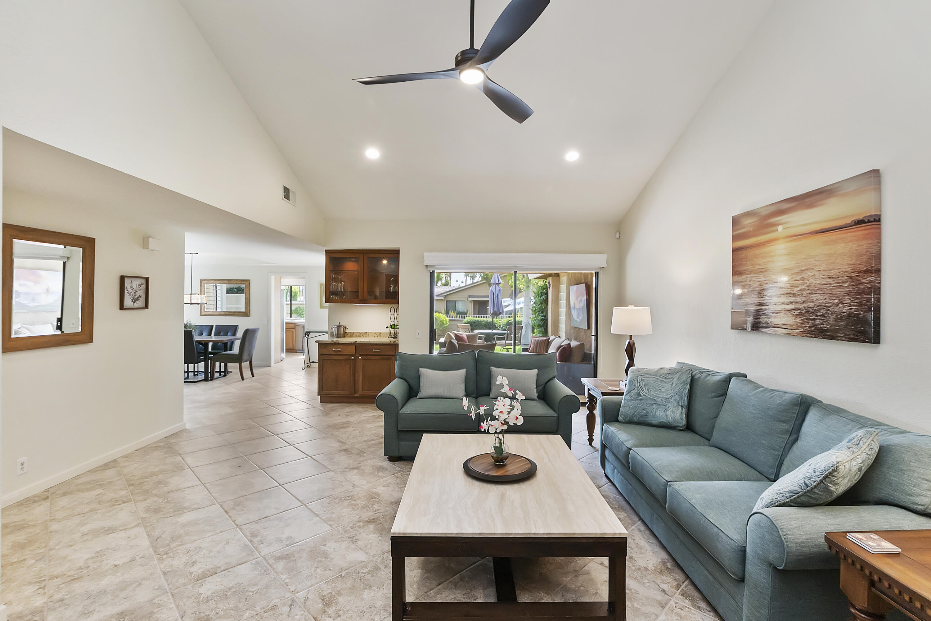 6 Maximo Way Palm Desert, CA 92260 - Photo 7 of 48 a living room with furniture kitchen view and a wooden floor