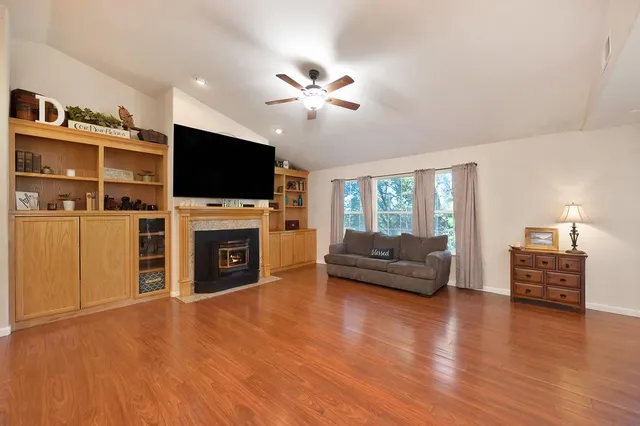 a kitchen with sink cabinets and stove top oven