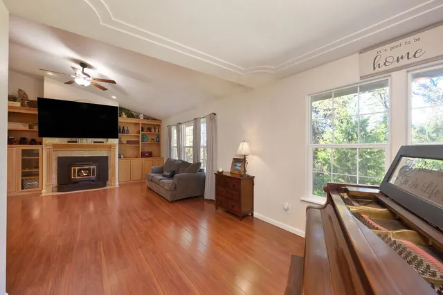 a kitchen with stainless steel appliances granite countertop a stove top oven a sink and dishwasher