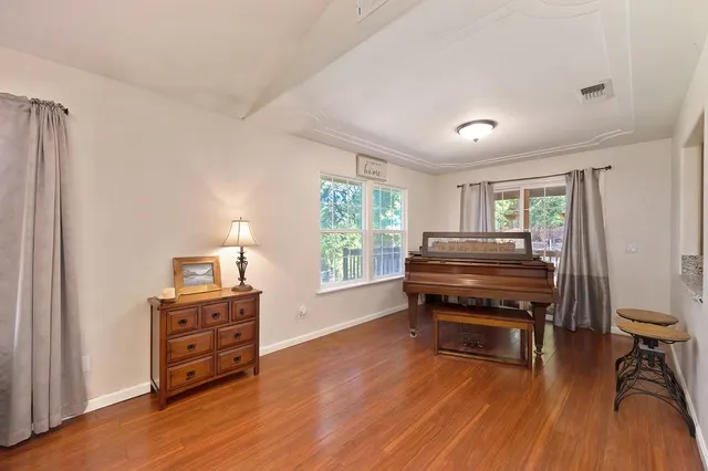 a view of a dining room with furniture