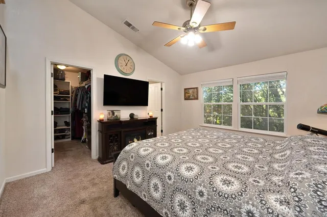 a view of a chairs and table in the balcony