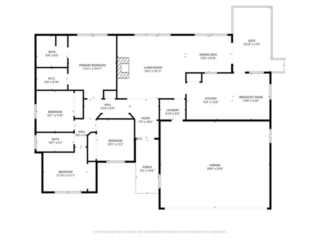 a tree in the middle of a yard