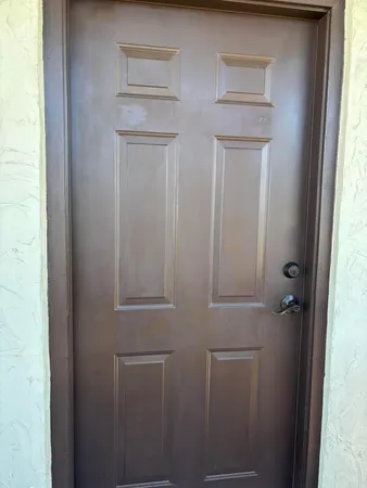 a bathroom with a glass door