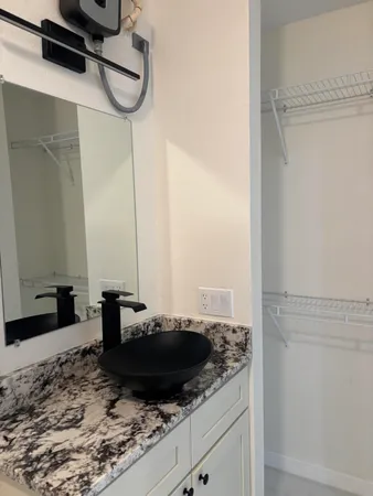 a view of a sink and dishwasher