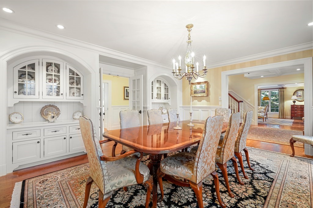 111 Livingston Road Wellesley, MA 02482 - Photo 14 of 42 a view of a dining room with furniture and chandelier