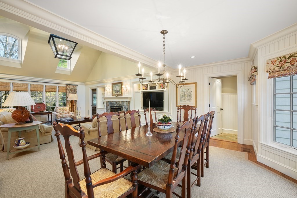 111 Livingston Road Wellesley, MA 02482 - Photo 21 of 42 a view of a dining room with furniture and a chandelier