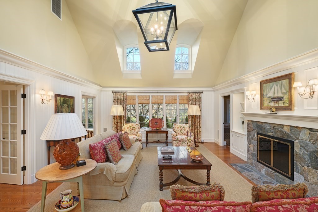 111 Livingston Road Wellesley, MA 02482 - Photo 24 of 42 a living room with furniture and a fireplace