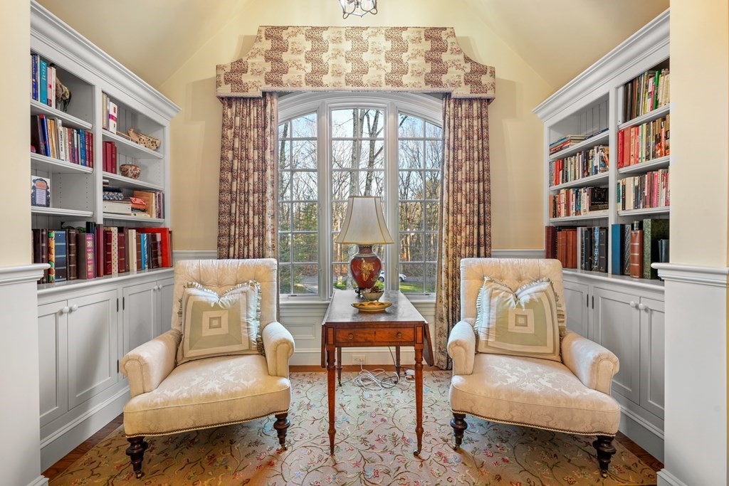111 Livingston Road Wellesley, MA 02482 - Photo 29 of 42 a living room with furniture and a book shelf