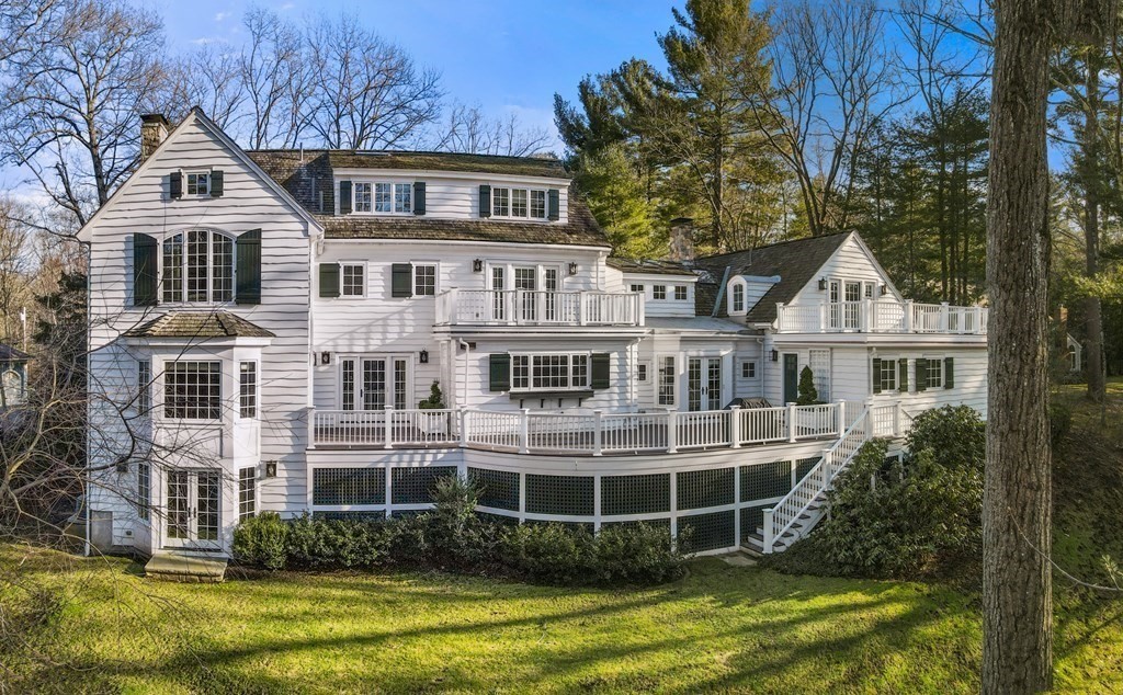111 Livingston Road Wellesley, MA 02482 - Photo 40 of 42 a front view of a house with a yard and potted plants