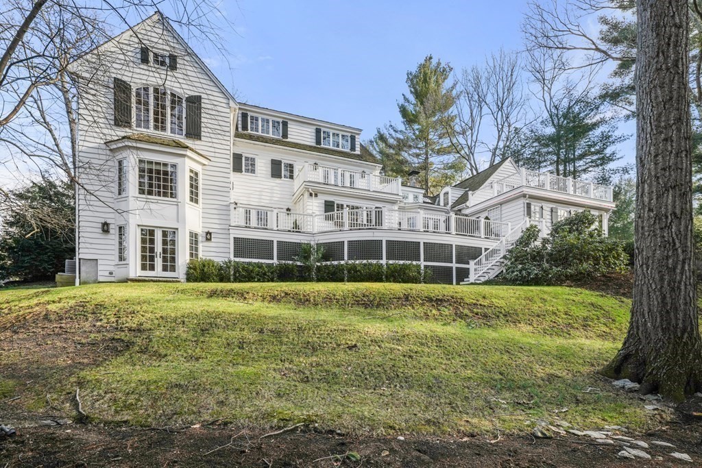 111 Livingston Road Wellesley, MA 02482 - Photo 41 of 42 a view of a big building with a big yard and plants