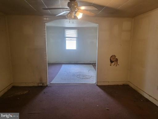 1008 Phillips Street Cambridge, MD 21613 - Photo 5 of 12 an empty room with windows and fan