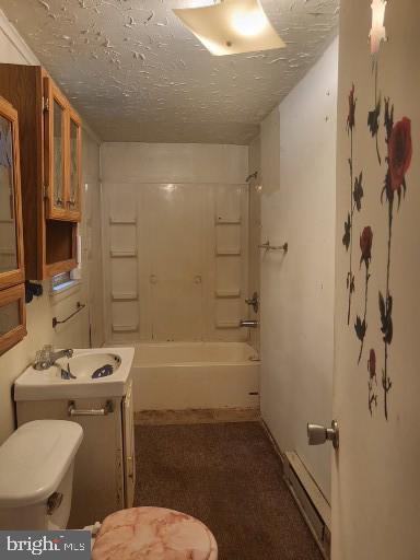 1008 Phillips Street Cambridge, MD 21613 - Photo 7 of 12 a bathroom with a sink toilet and shower