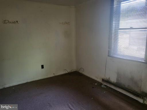 1008 Phillips Street Cambridge, MD 21613 - Photo 9 of 12 an empty room with a window
