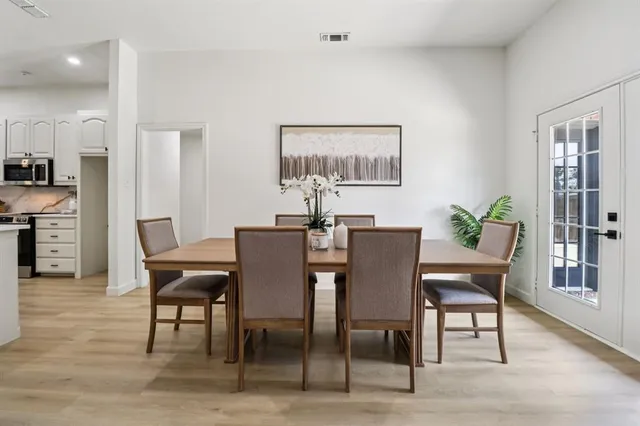 a view of a dining room with furniture