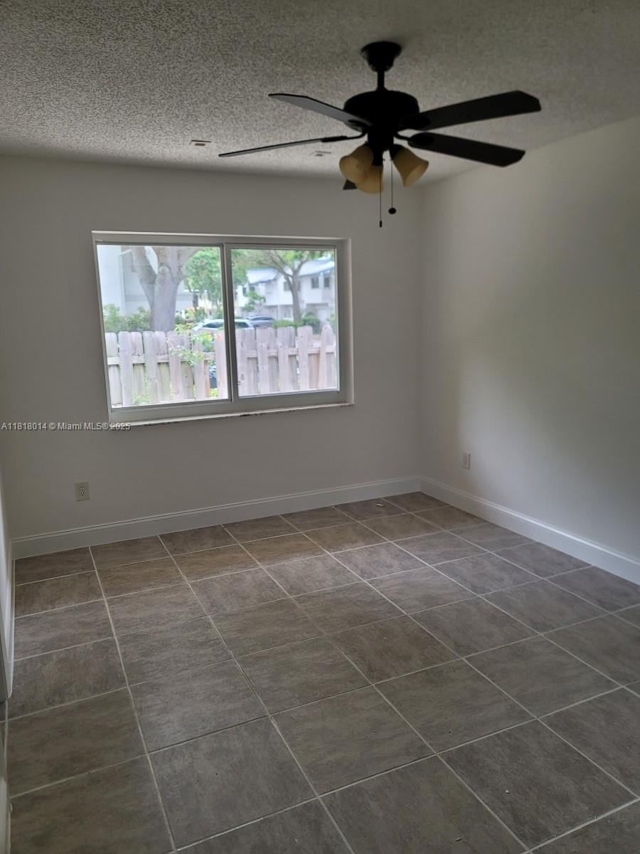 3490 Atlanta Street, Unit B Hollywood, FL 33021 - Photo 13 of 21 a view of an empty room with a window